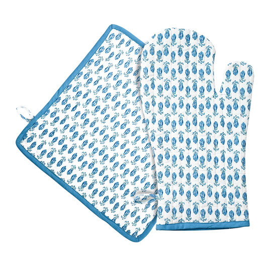 Set of two blue and white patterned towels on a white background