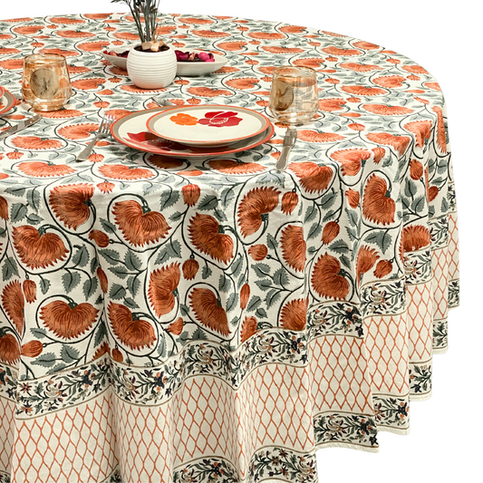 Round tablecloth with floral pattern on a round table