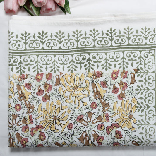 Floral patterned fabric with intricate design on a white background