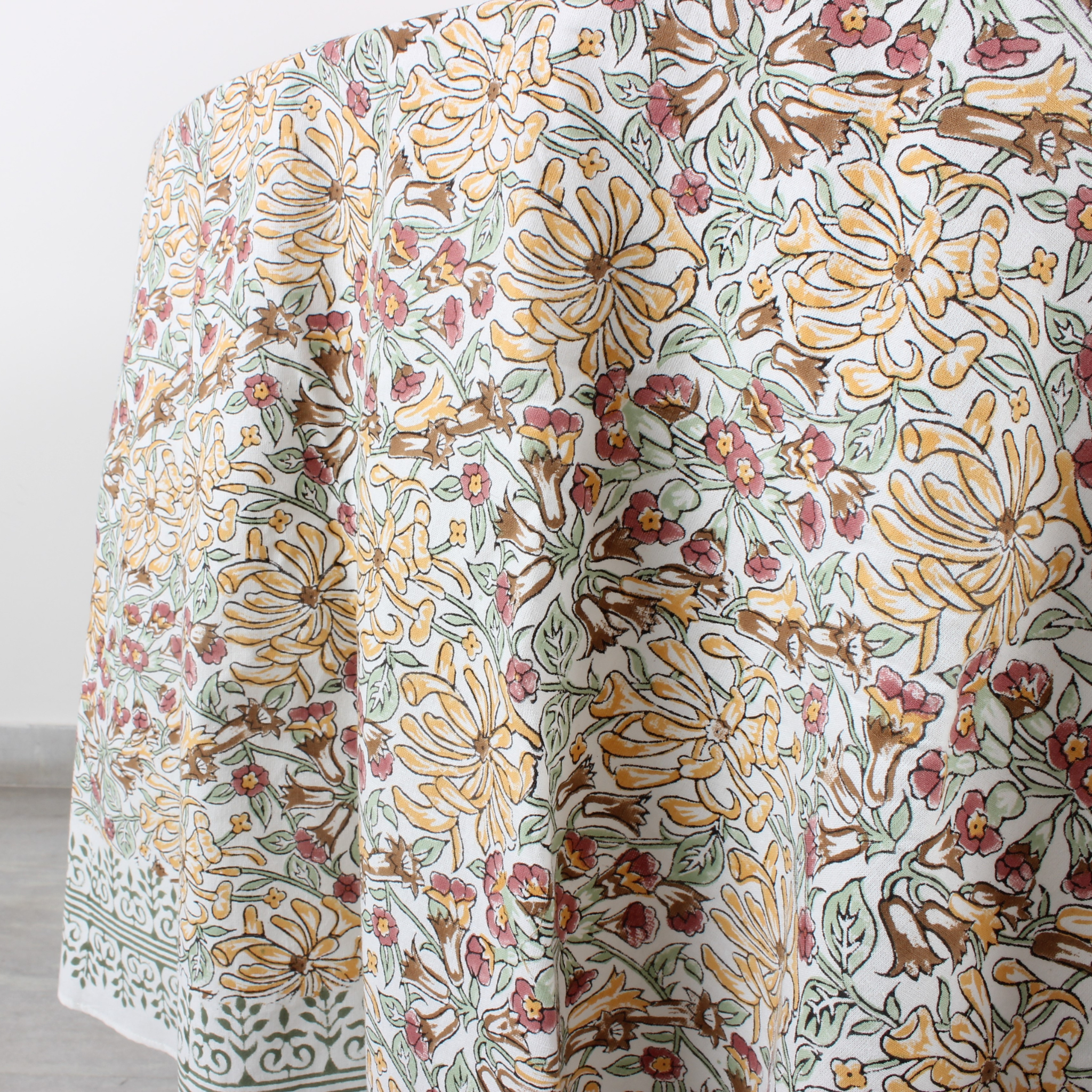 Floral patterned fabric with a white background