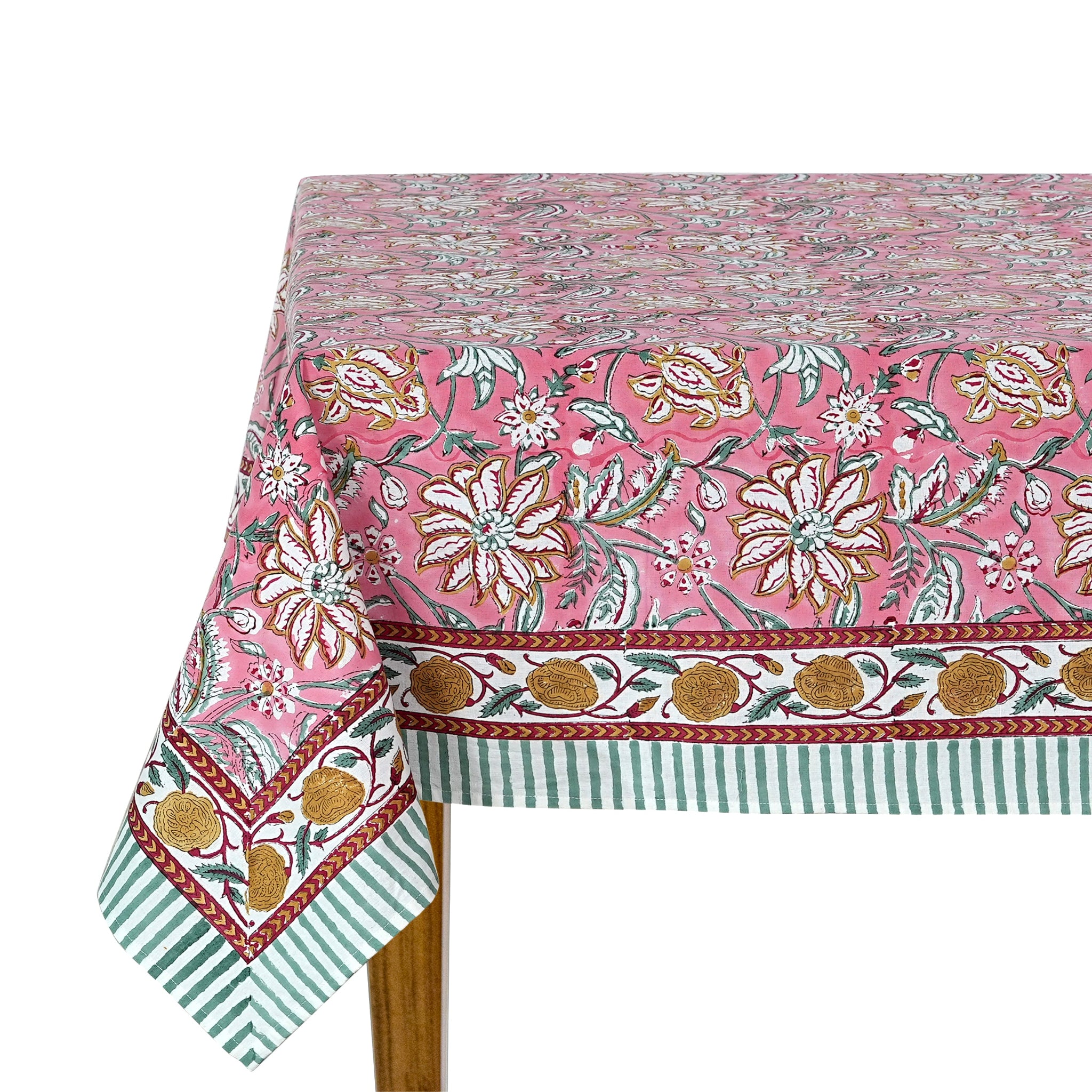 Floral patterned tablecloth with pink background on a white background