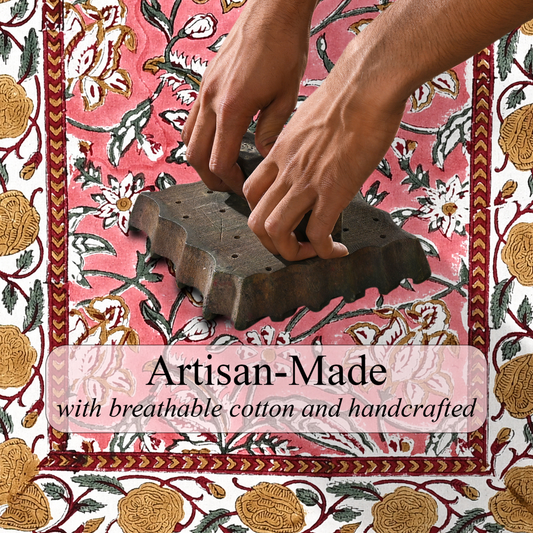 Person using a stamp on a floral-patterned fabric with 'Artisan-Made' text overlay.