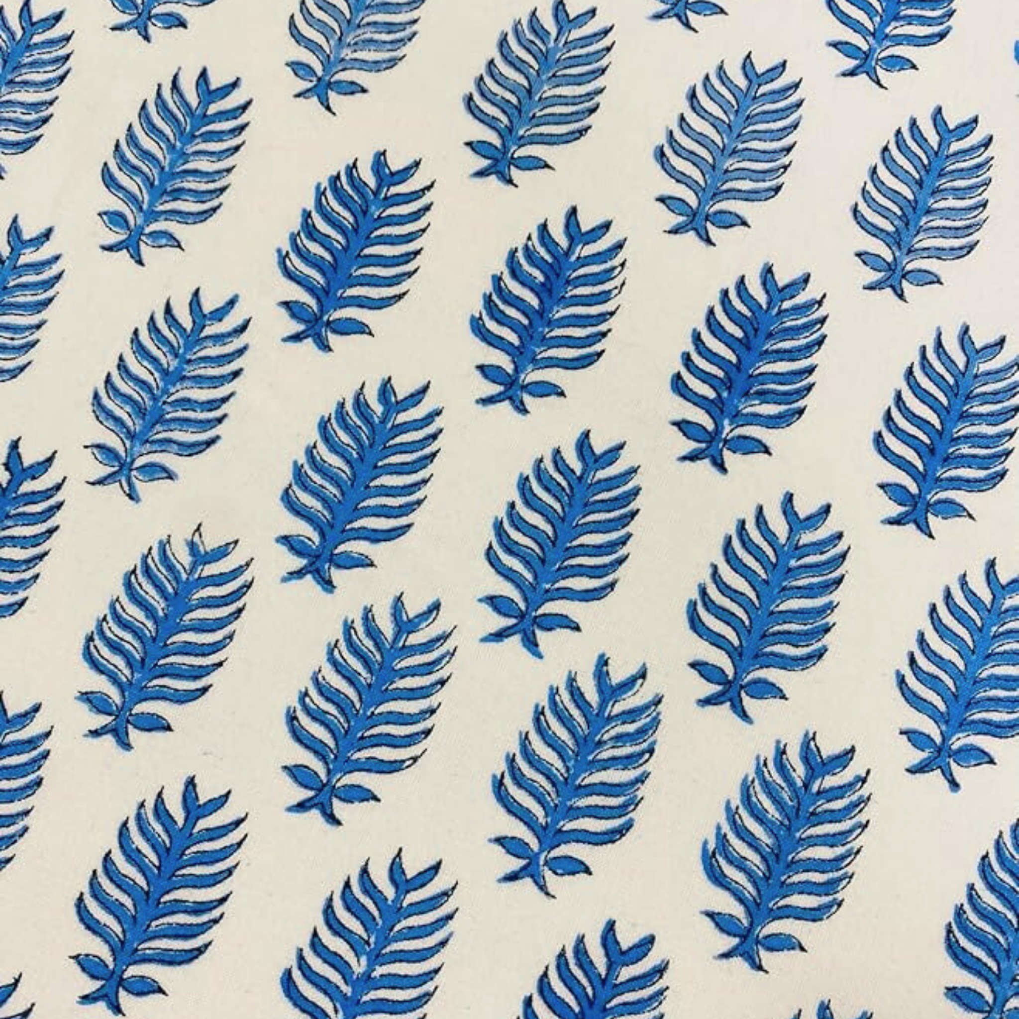 Pattern of blue leaves on a beige background