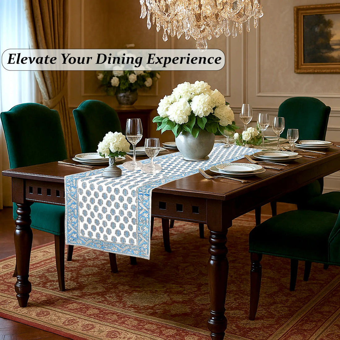 Dining room with a table set for dinner, flowers, and a chandelier.
