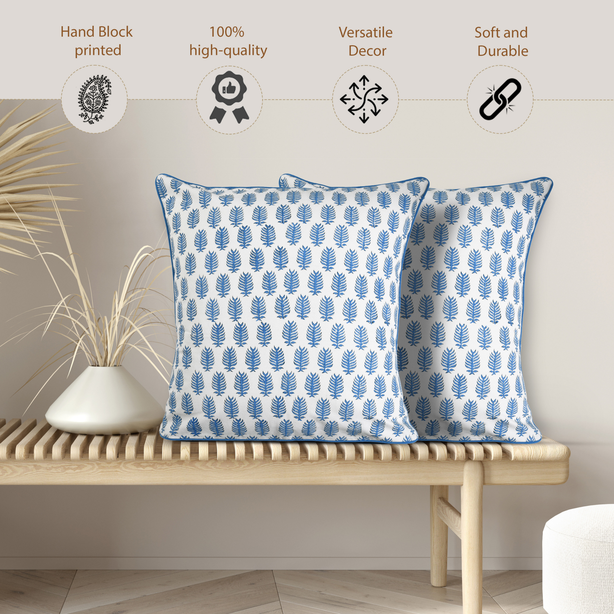 Two blue patterned pillows on a wooden bench with decorative elements and text about product features.
