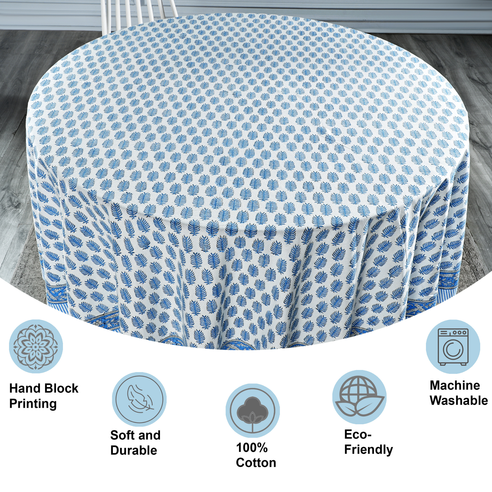 Round table with blue and white patterned cover on a wooden floor, with product features displayed below.