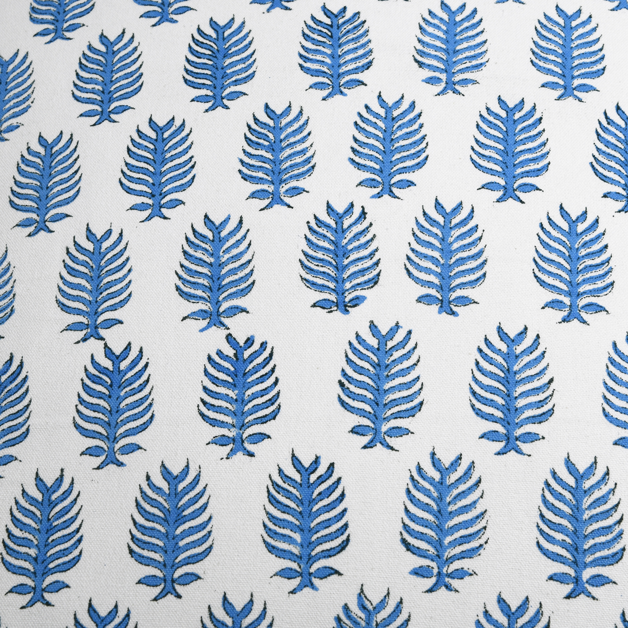 Pattern of blue leaf shapes on a white background