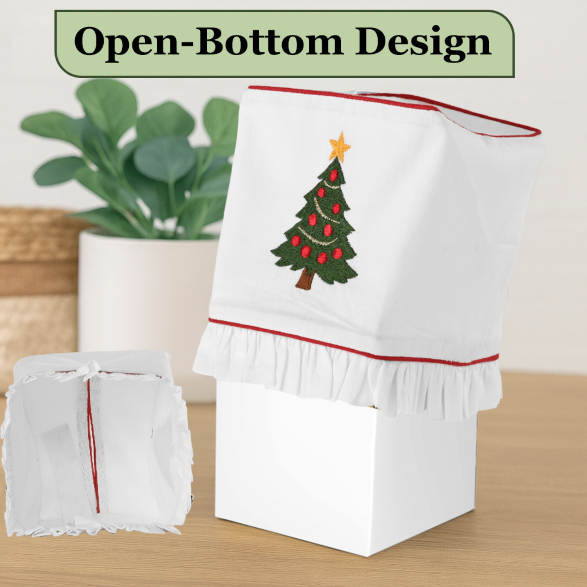 Towel with Christmas tree design and open-bottom design text above it.