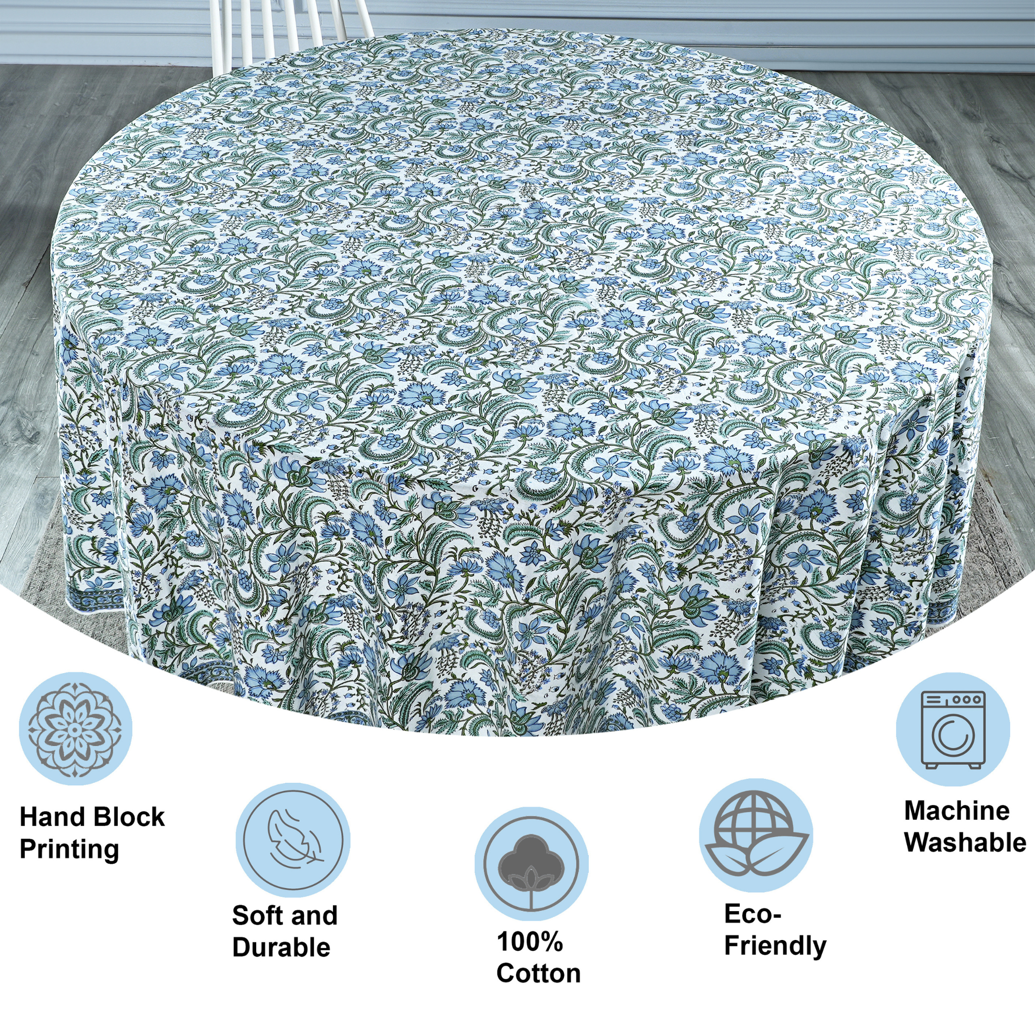 Floral patterned tablecloth on a round table with product features displayed below.