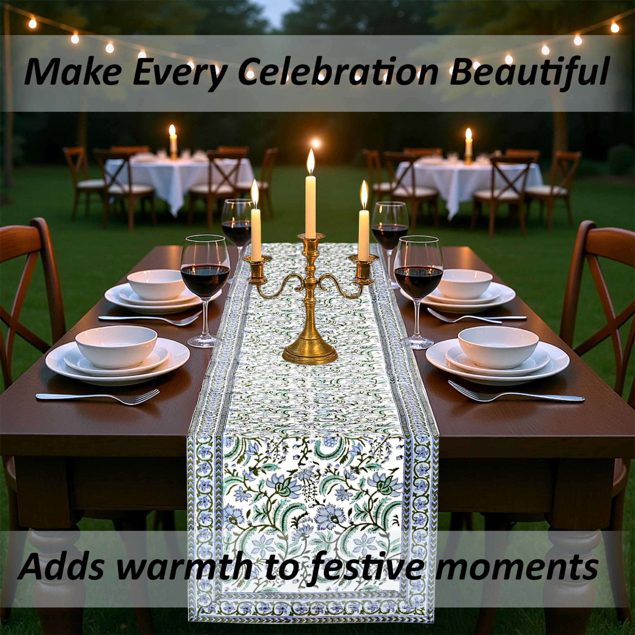 Dining table set with a decorative table runner, candles, and wine glasses outdoors.