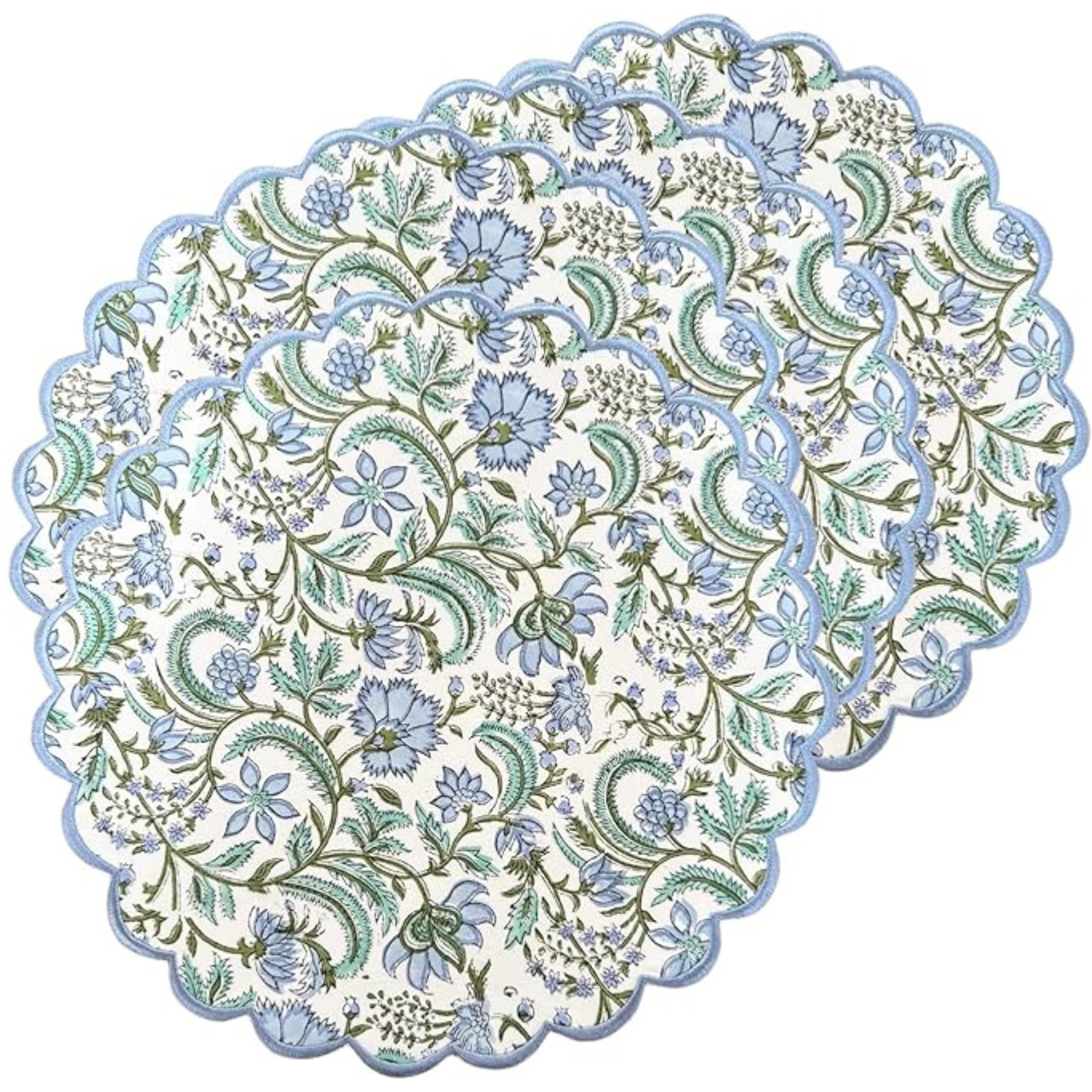 four blue floral placemats on a white background