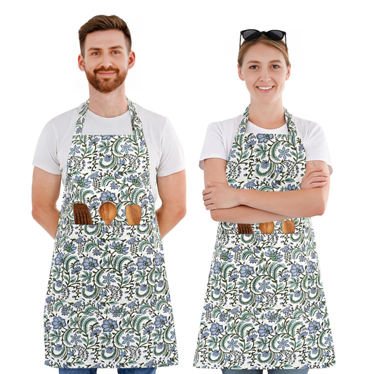 Two people wearing floral aprons with wooden tool holders on a white background