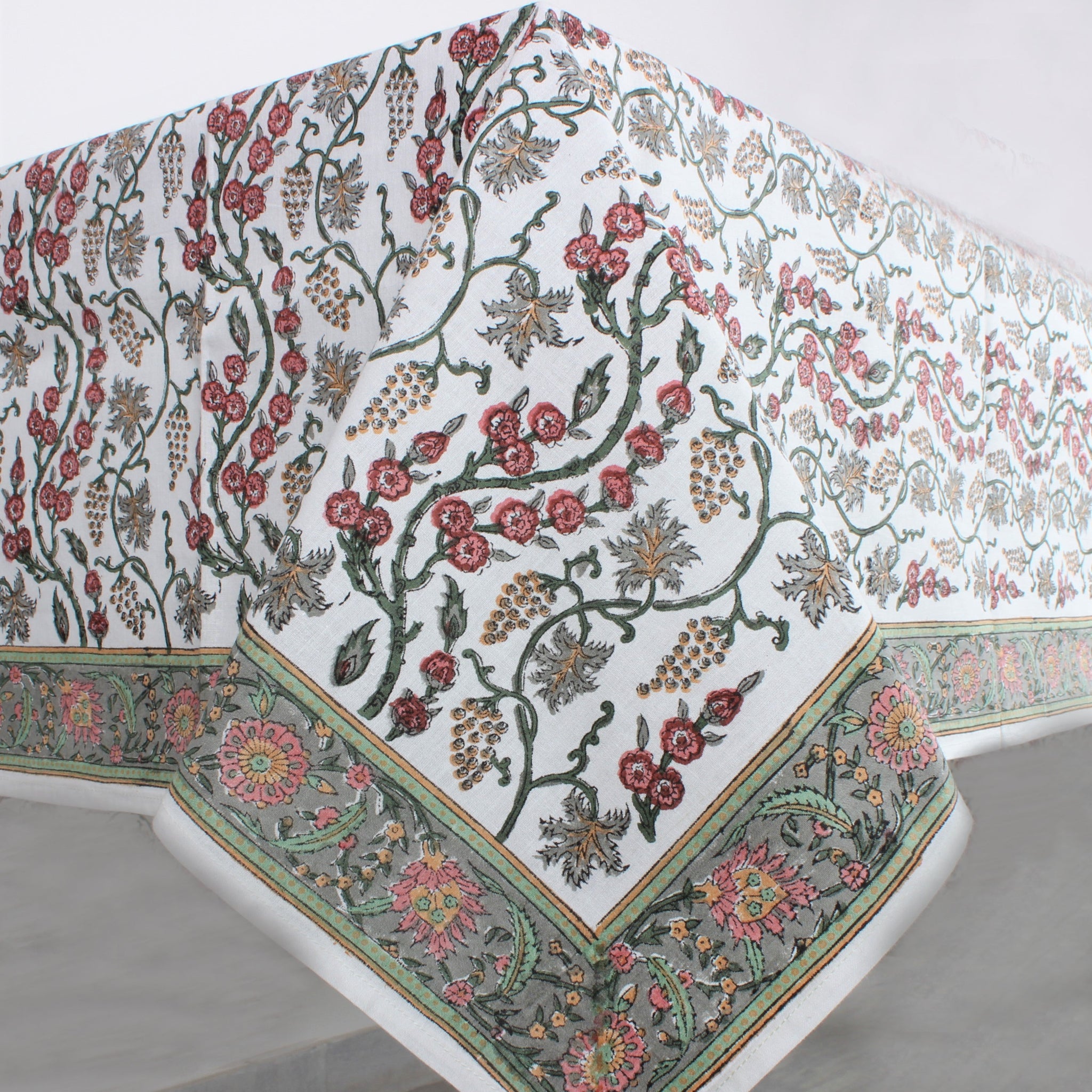 Floral patterned tablecloth on a white table