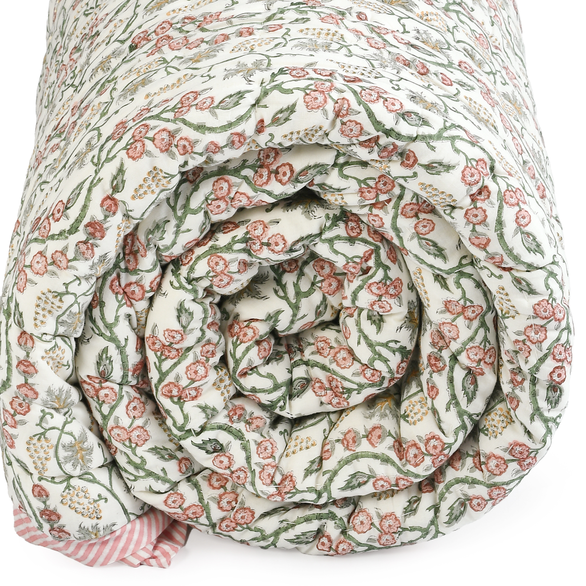 Rolled-up floral-patterned fabric on a white background
