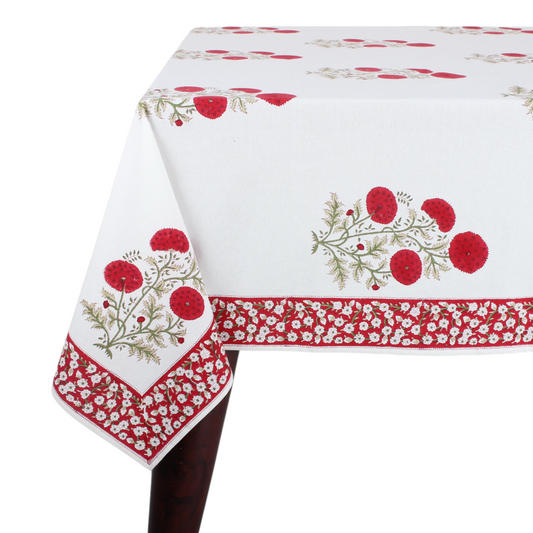 Decorative tablecloth with red floral patterns on a white background