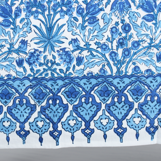 Blue floral and geometric pattern on a white background