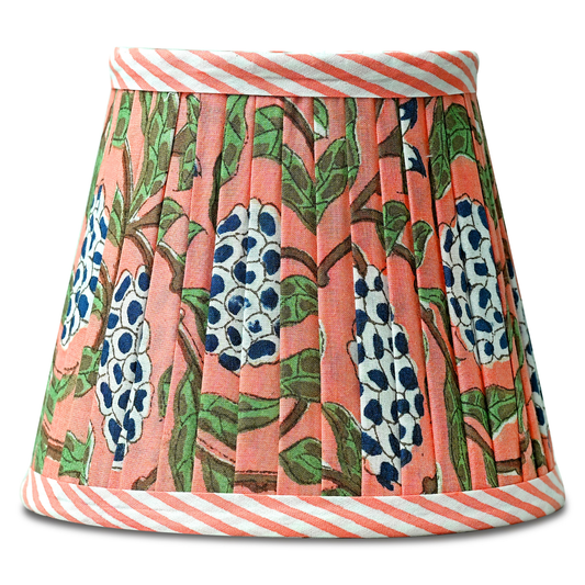 Lampshade with floral pattern and striped hem on a white background