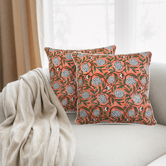 Decorative pillows with floral pattern on a sofa