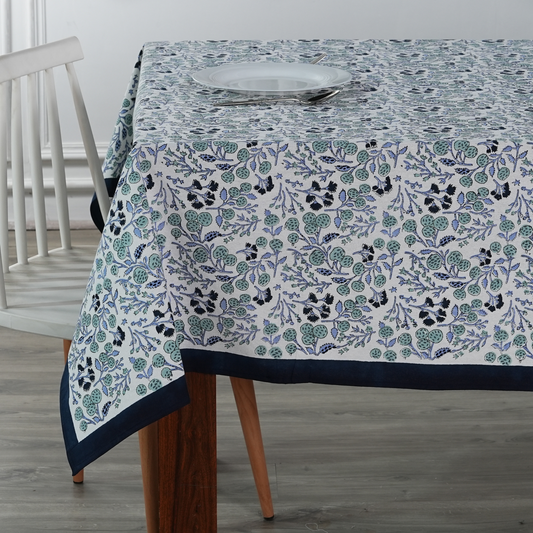 Tablecloth with floral pattern on a wooden table