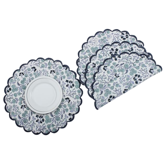 Set of floral-patterned placemats on a white background