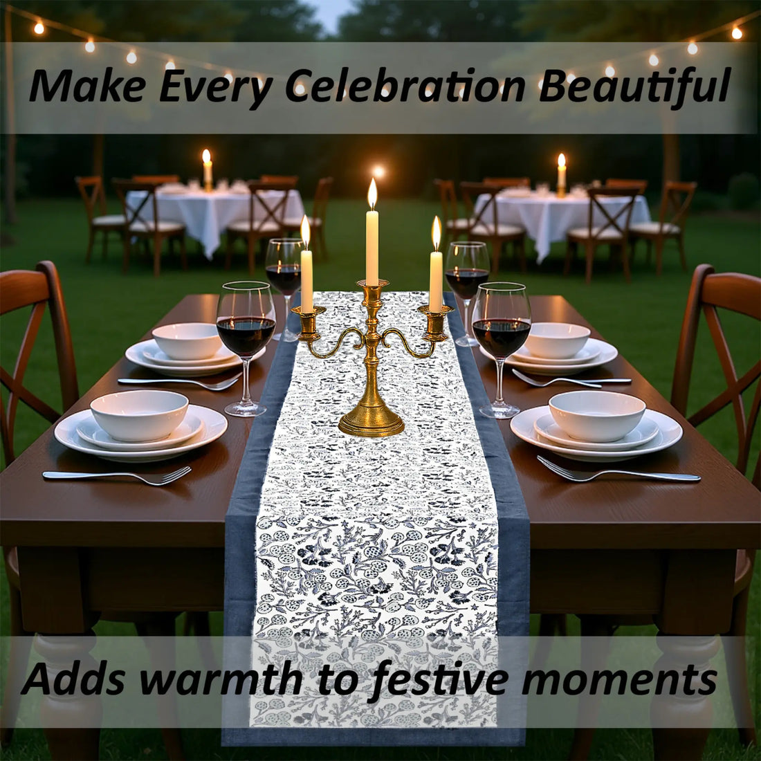 Dining table set for a celebration with candles and a decorative table runner.