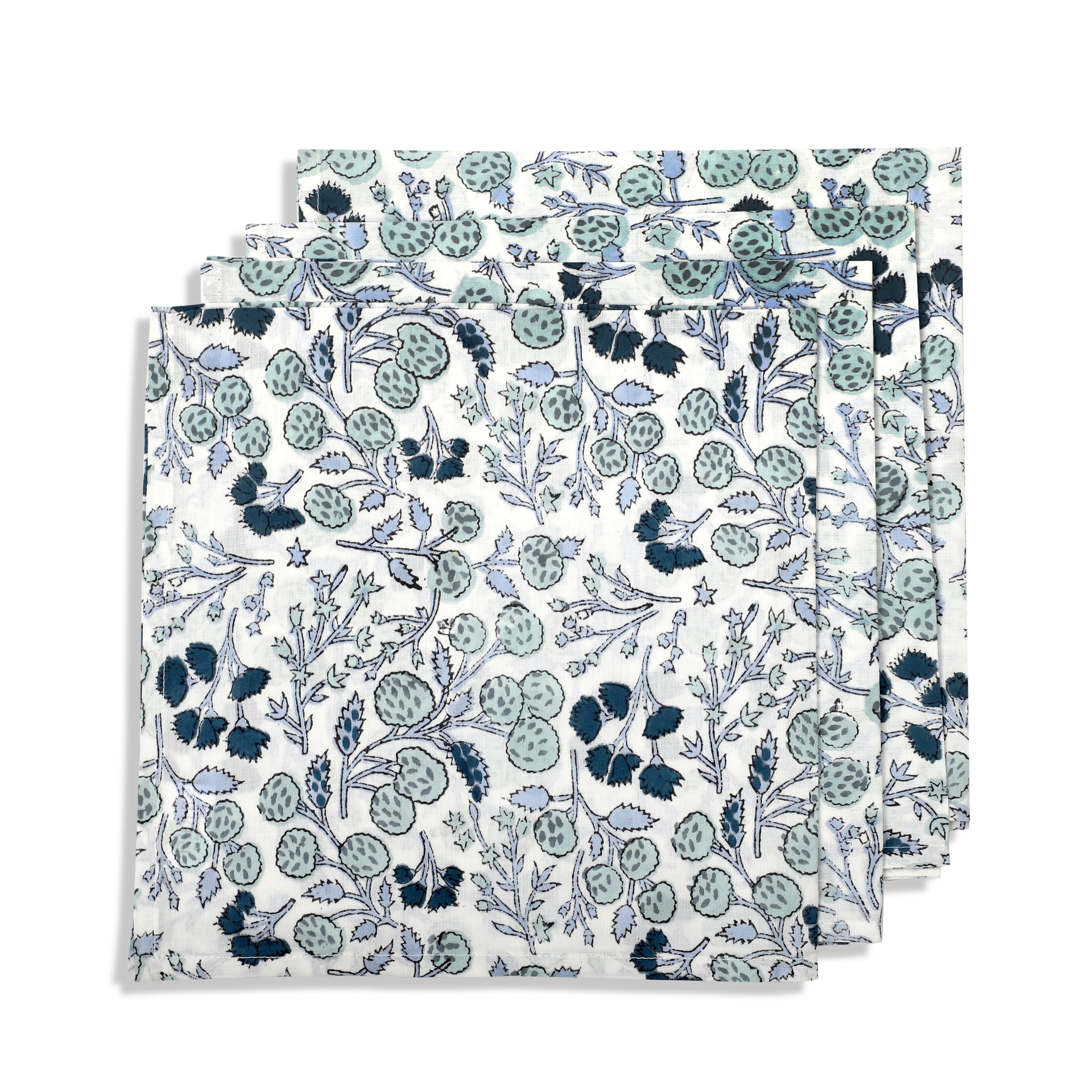 Set of three floral-patterned napkins on a white background