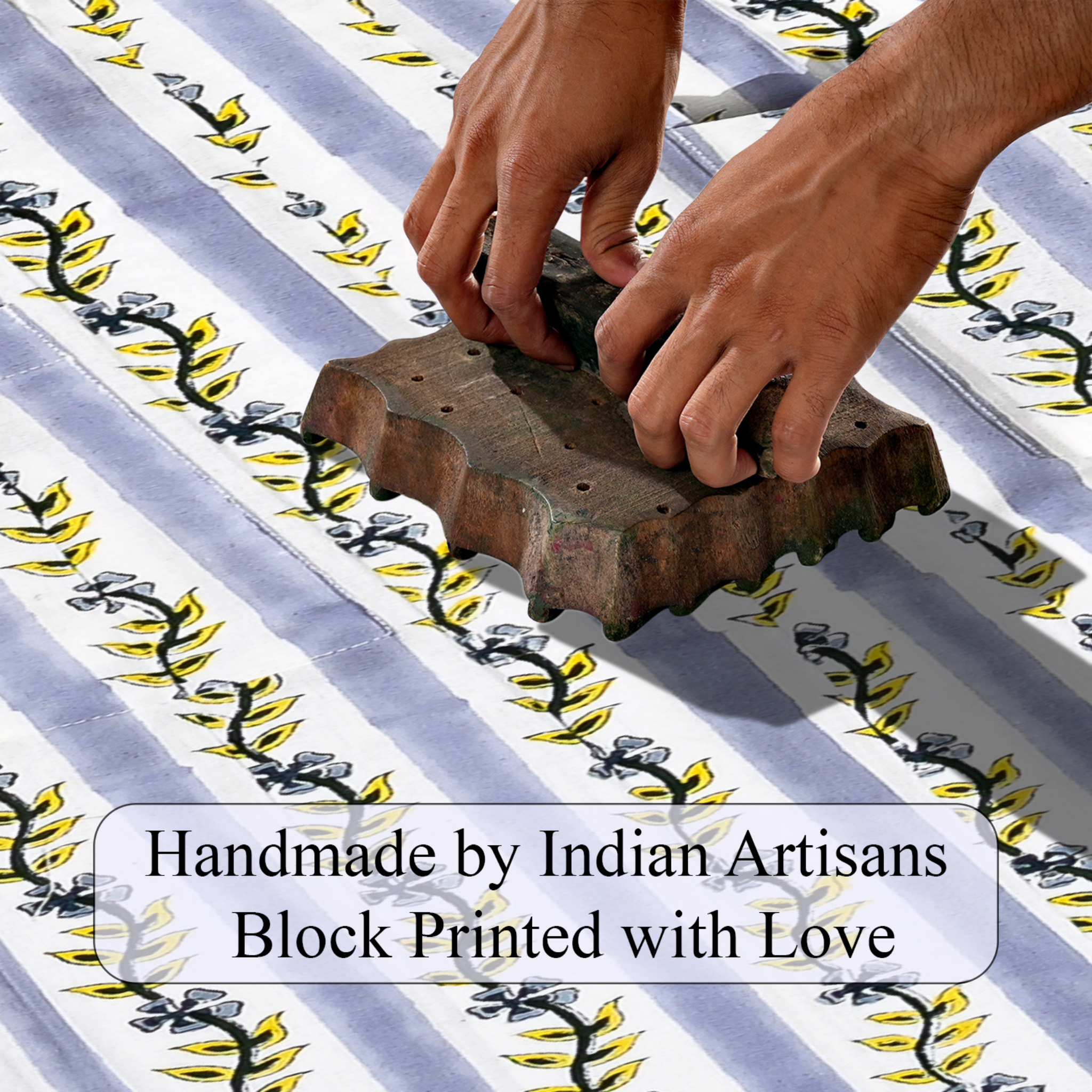 Hand block printing on fabric with text 'Handmade by Indian Artisans Block Printed with Love'.