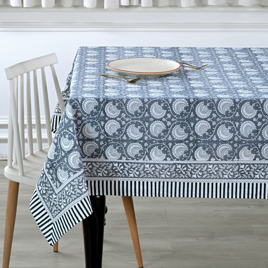 Tablecloth with blue and white pattern on a dining table