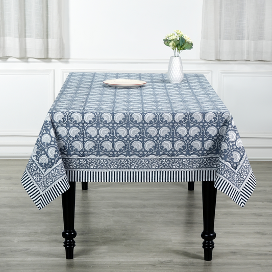Tablecloth with blue and white pattern on a wooden table