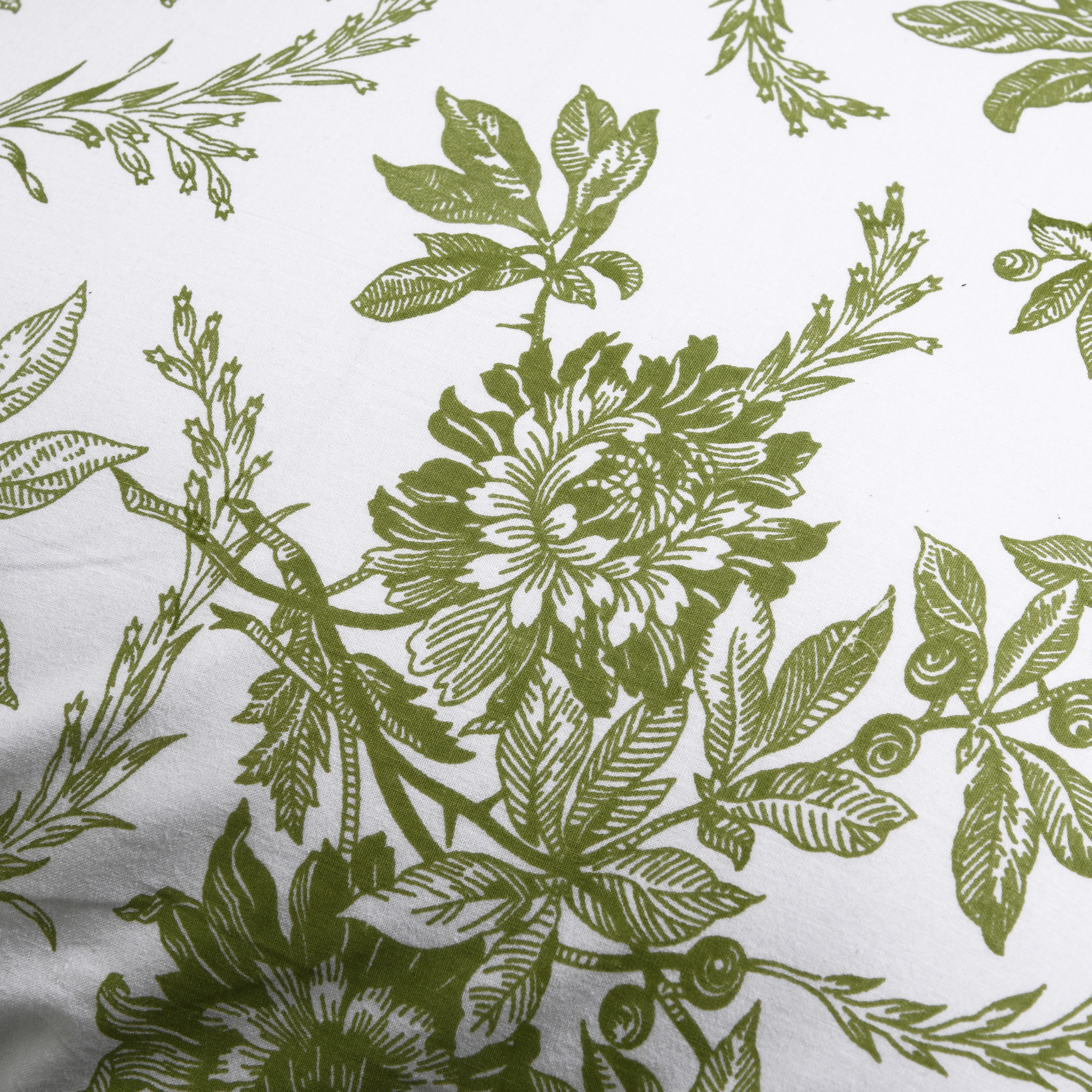 Pattern of green floral and leaf designs on a white background