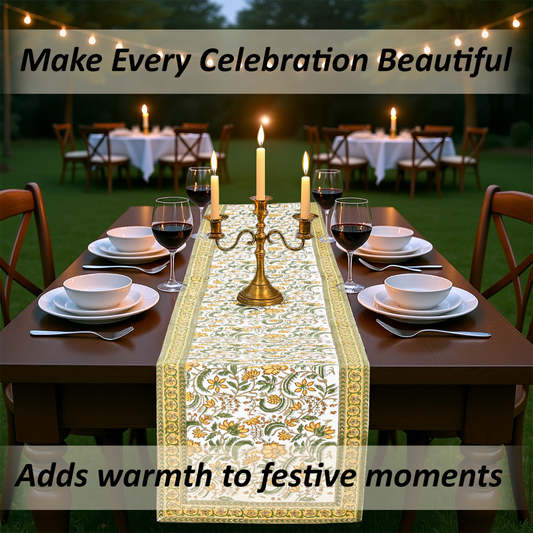 Decorated outdoor table setting with a floral table runner, candles, and wine glasses.