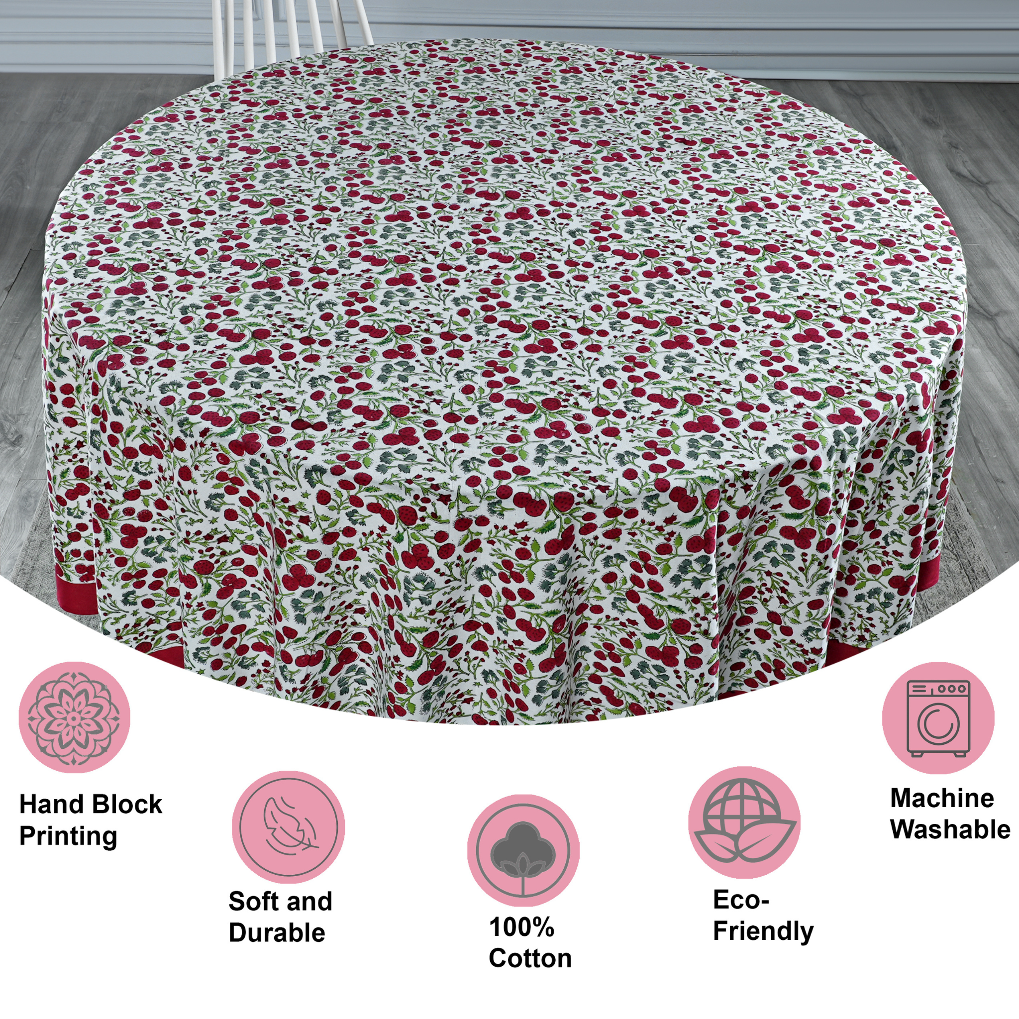 Floral patterned tablecloth on a round table with product features displayed below.