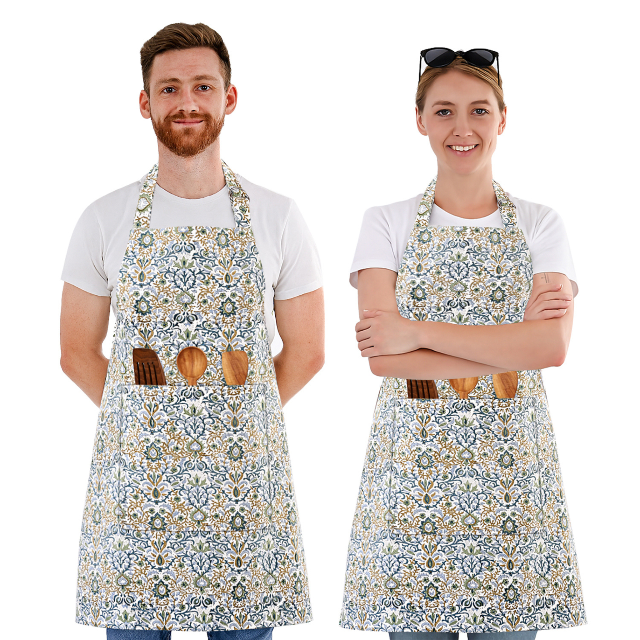 Two people wearing floral aprons with wooden tool holders on a white background