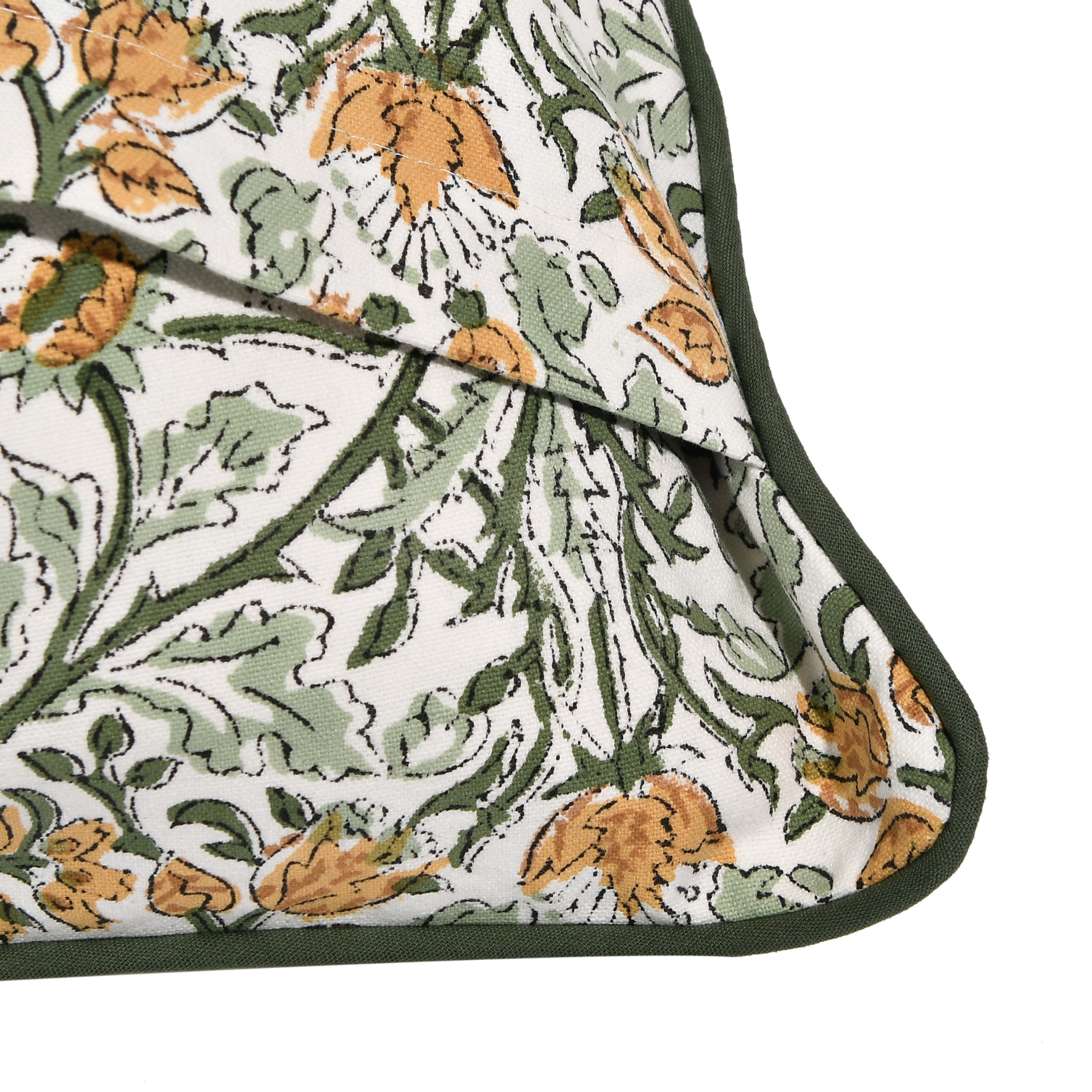 Floral patterned fabric with green, orange, and white colors on a white background