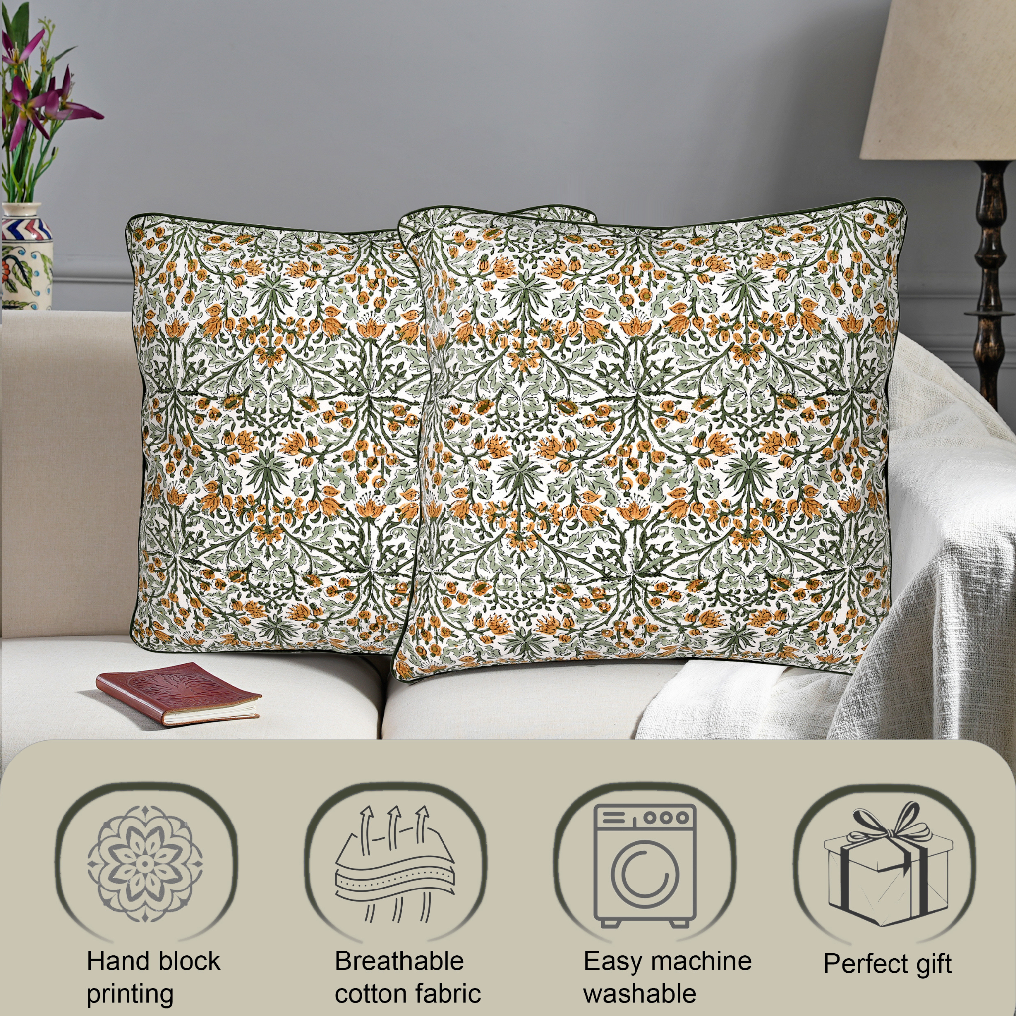 Floral patterned pillows on a sofa with product features displayed below.