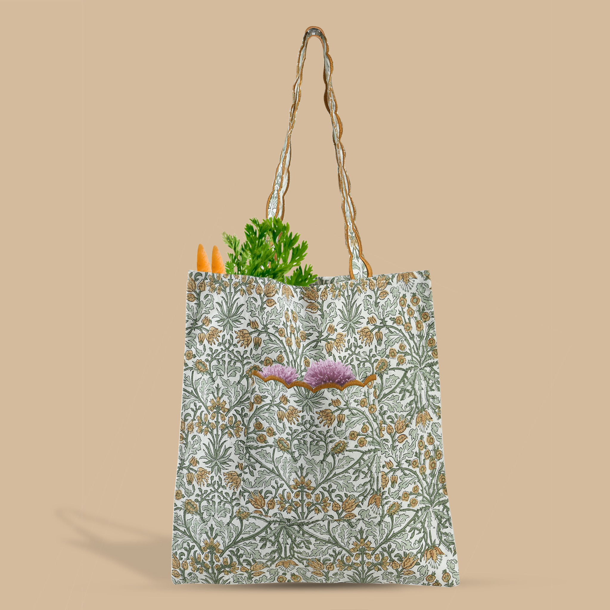 Floral-patterned tote bag with vegetables on a beige background