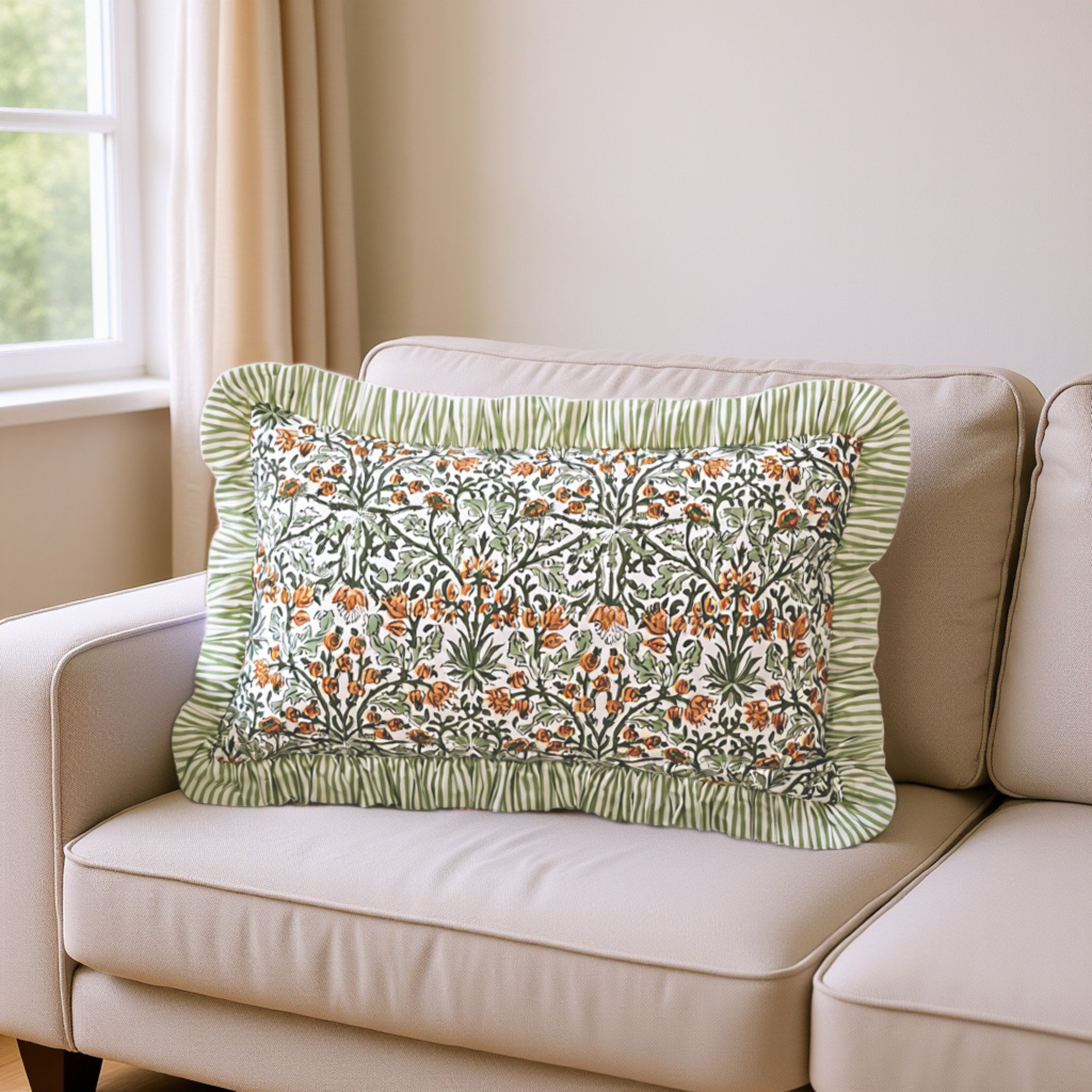 Decorative pillow with floral pattern on a beige sofa by a window.