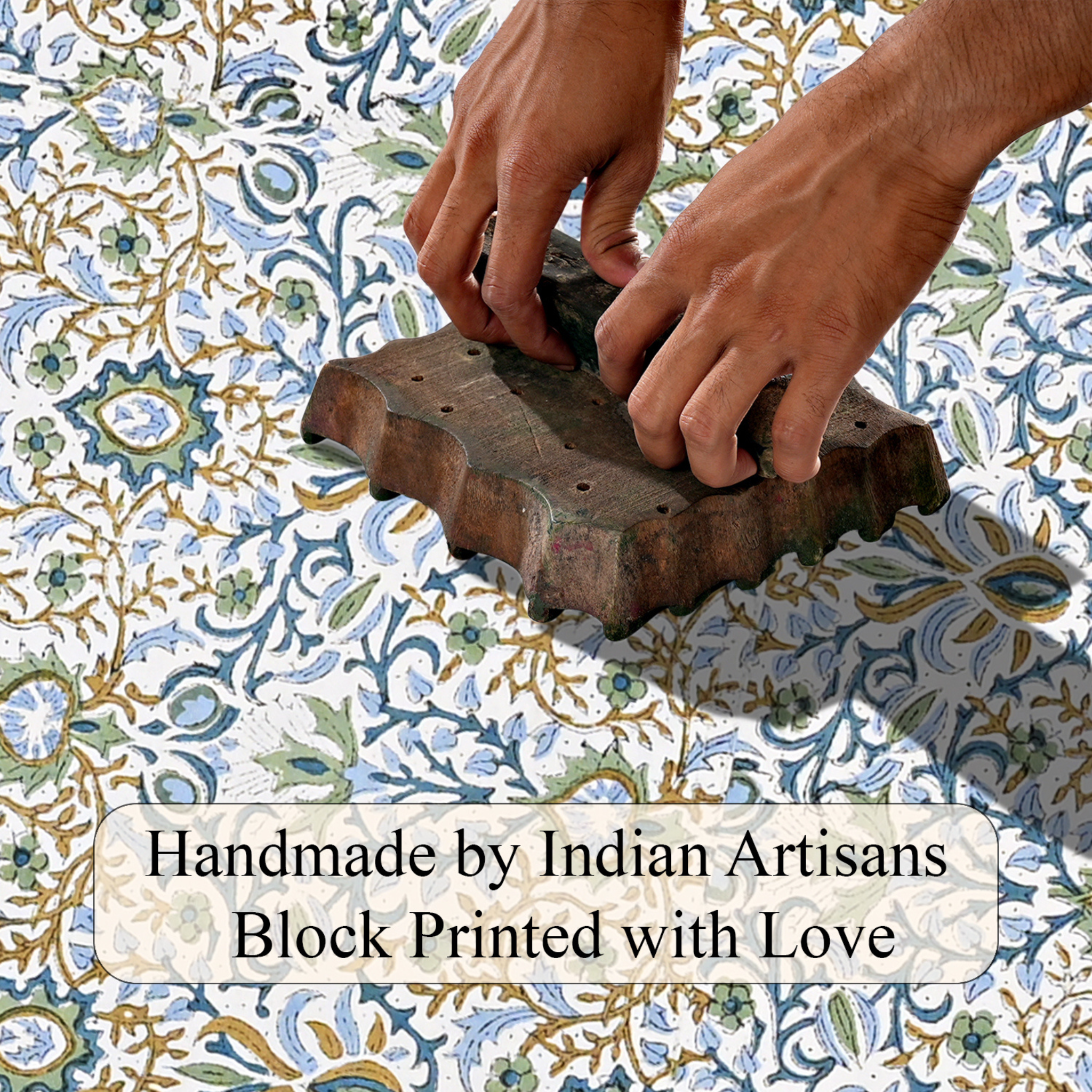 Hand block printing on fabric with text 'Handmade by Indian Artisans Block Printed with Love'.