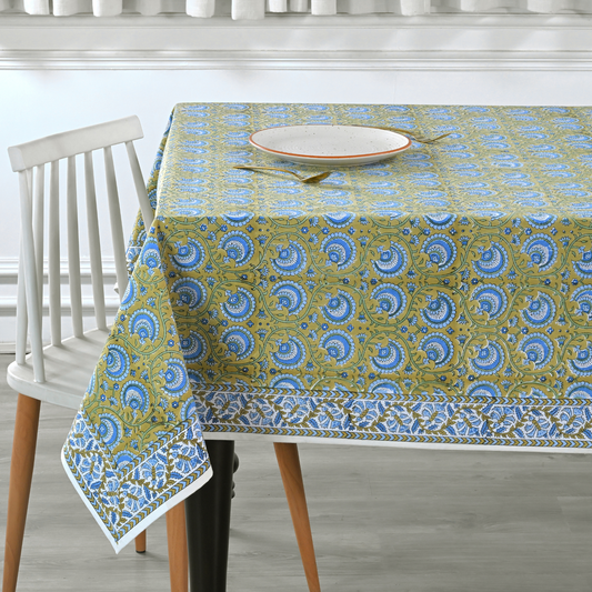 Tablecloth with blue and green pattern on a dining table