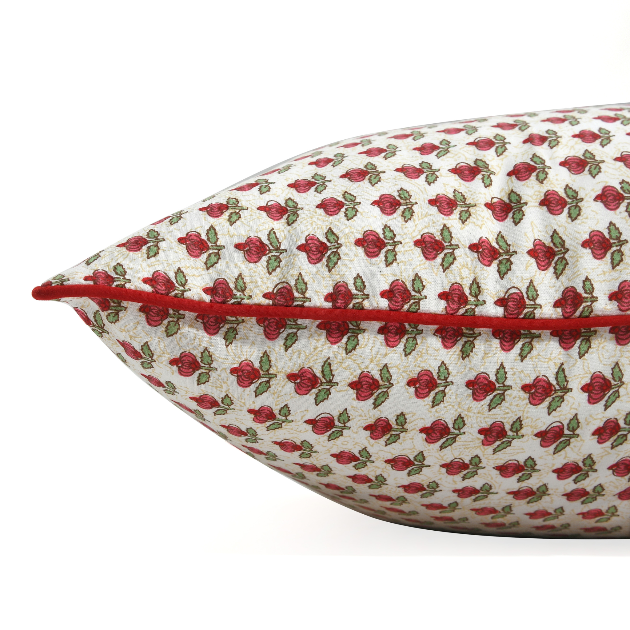 Decorative pillow with red floral pattern on a white background
