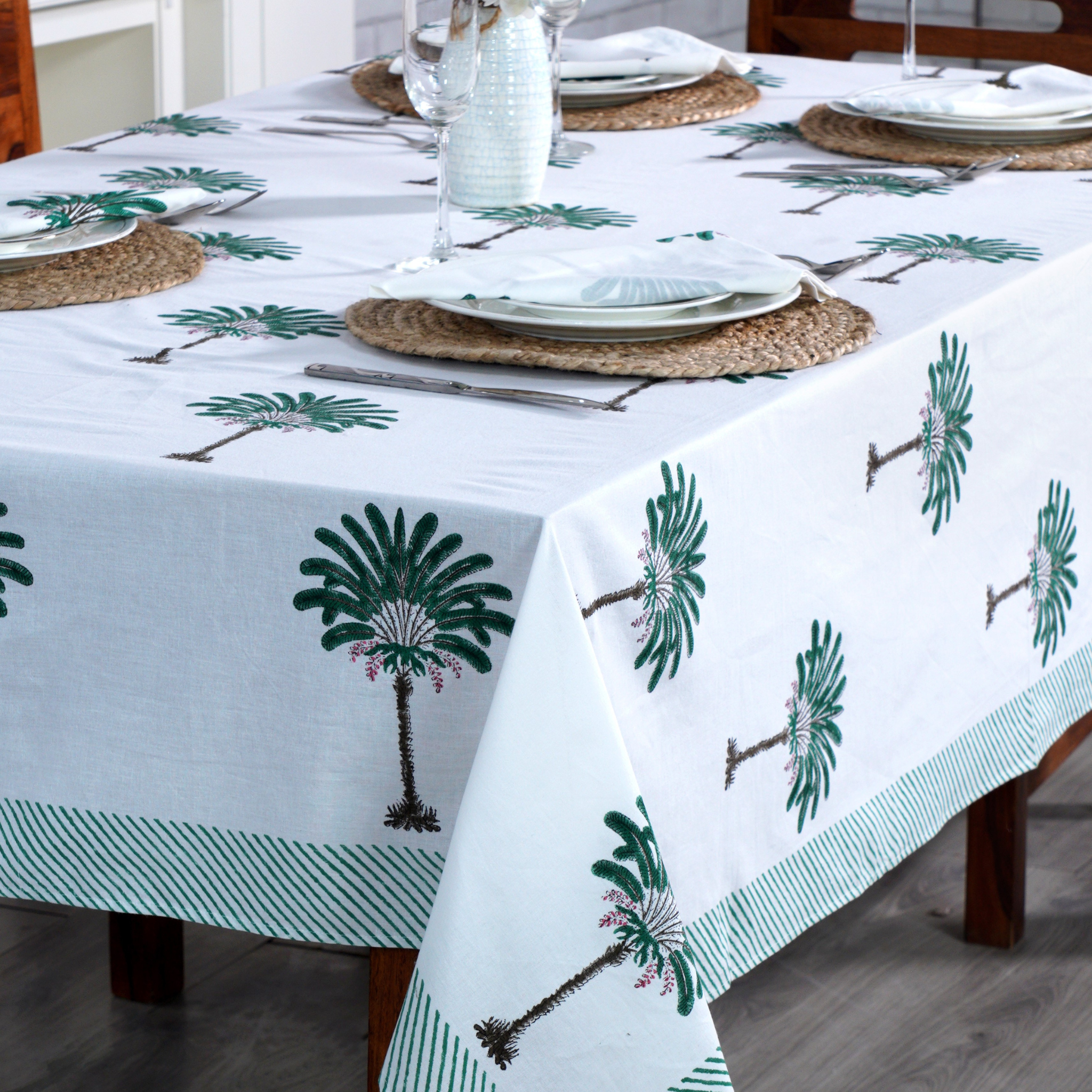 Tablecloth with palm tree design on a dining table