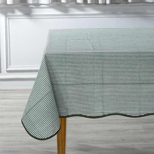 Striped tablecloth on a wooden table in a kitchen setting
