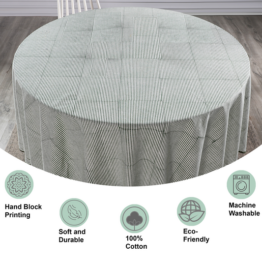 Round table with a striped tablecloth on a wooden floor, featuring icons and text about product features.