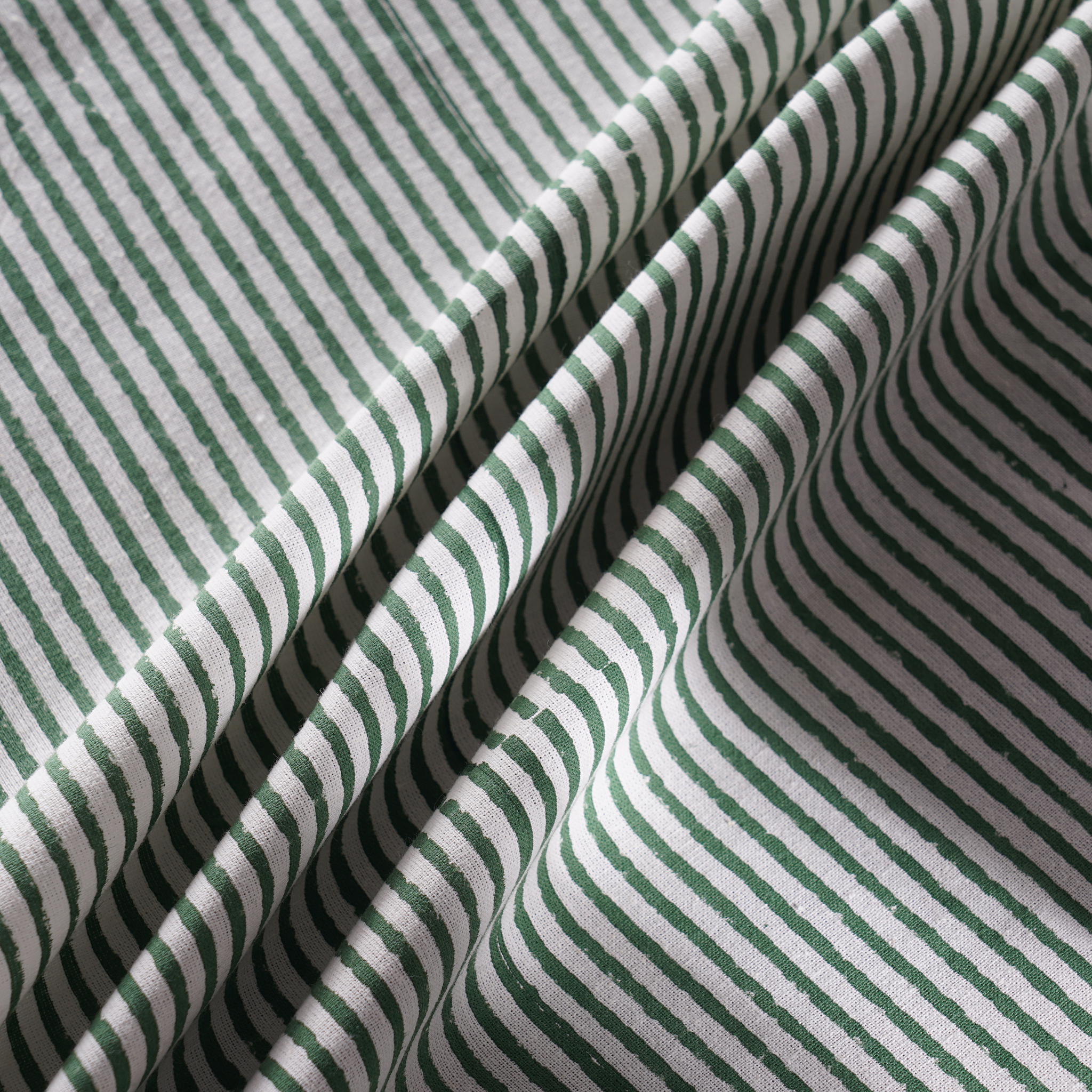 Close-up of green and white striped fabric