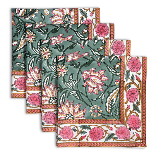 Set of floral patterned napkins with pink and green colors on a white background