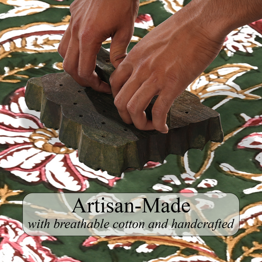Hands using a wooden tool on a patterned fabric with 'Artisan-Made' text overlay.