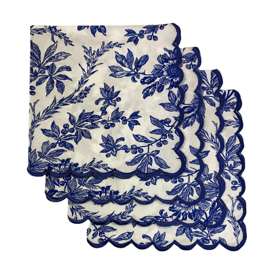 Set of blue floral placemats on a white background
