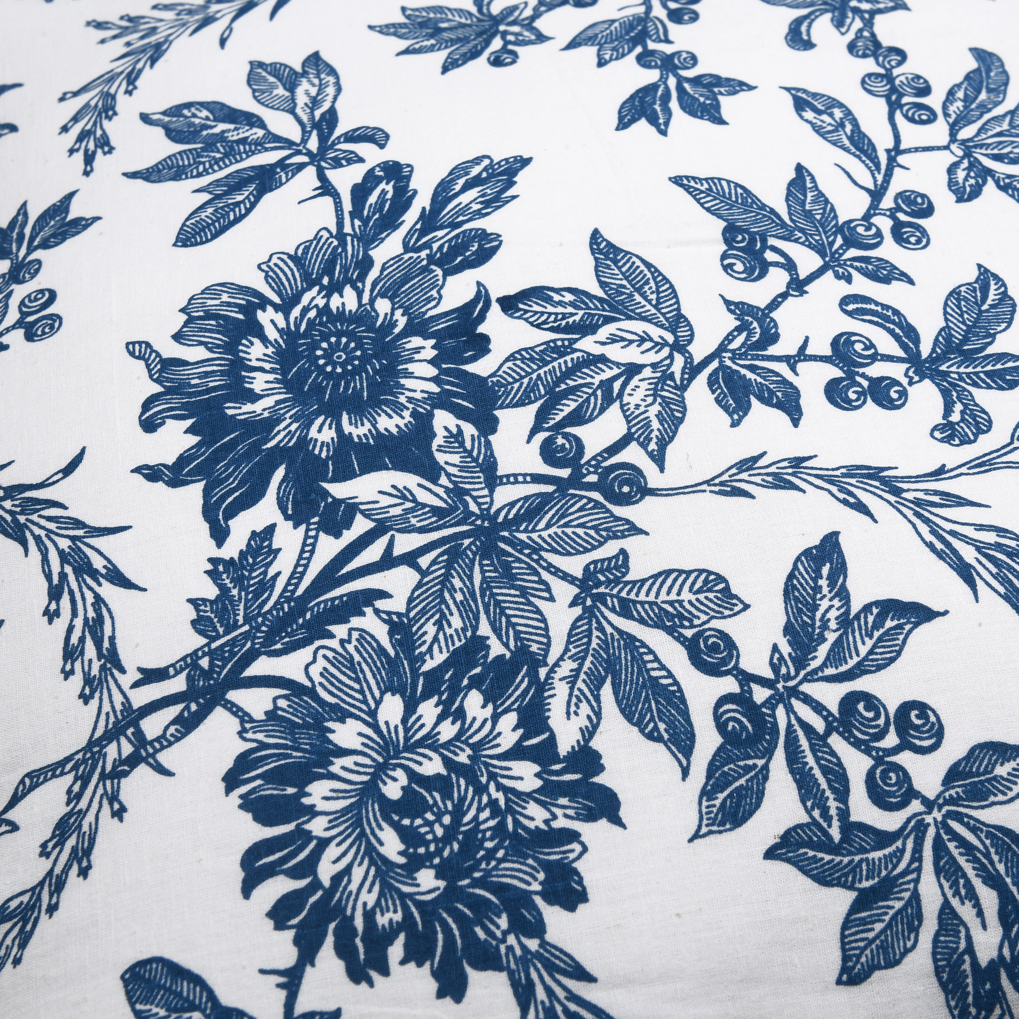 Blue floral and leaf pattern on a white background