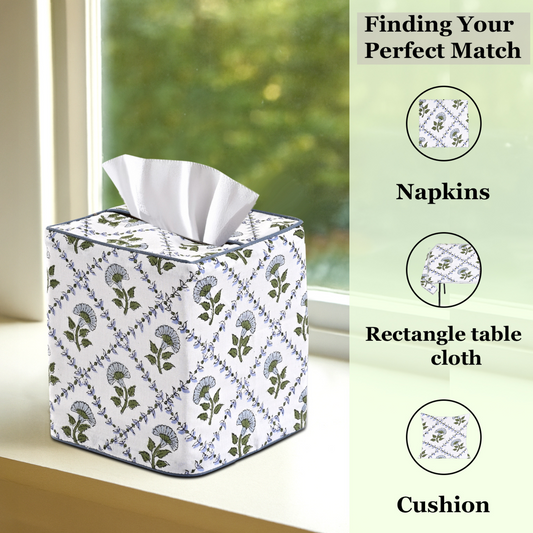 Decorative tissue box cover with floral pattern on a windowsill, with text suggesting matching products.