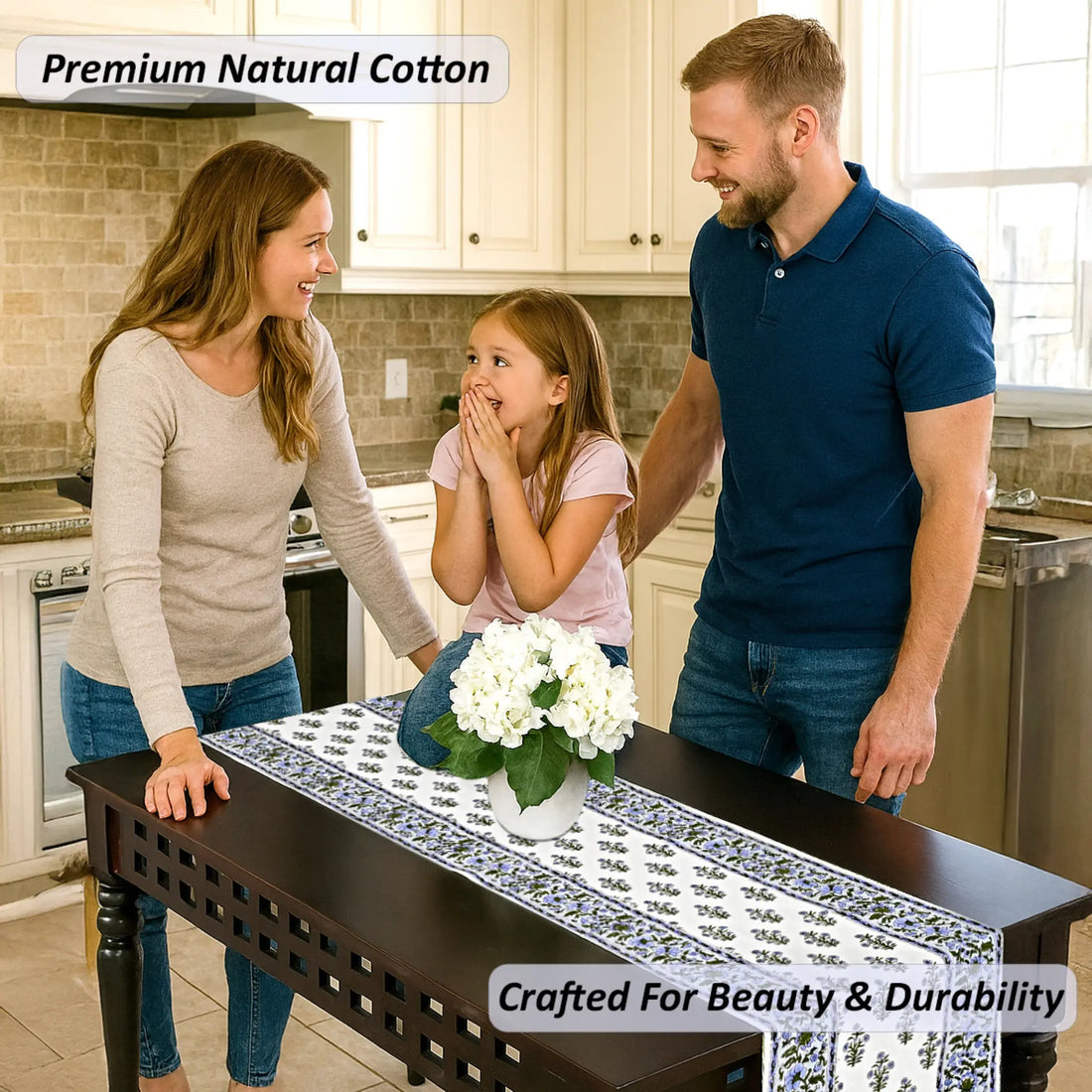 Family in a kitchen with a table runner displaying 'Premium Natural Cotton' and 'Crafted For Beauty & Durability'.
